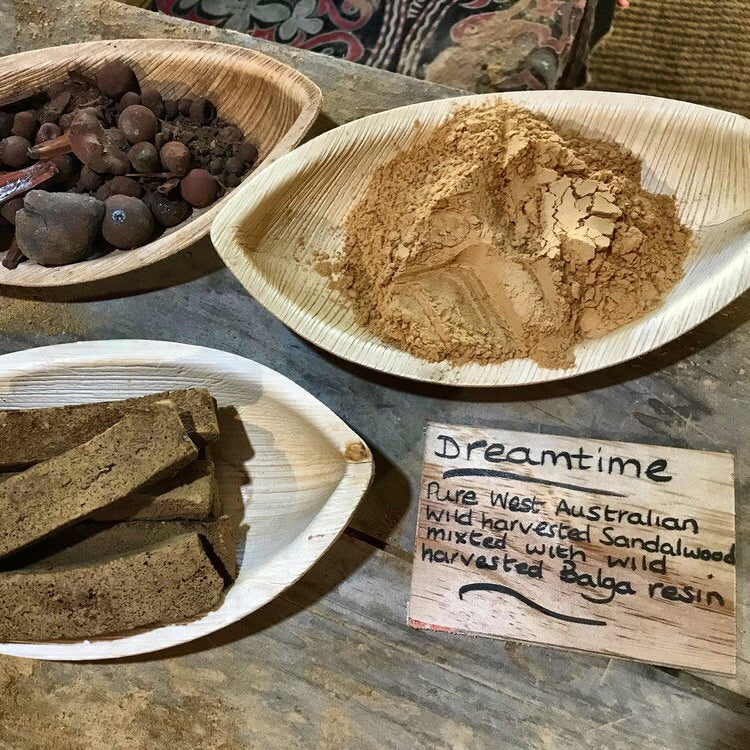 Dreamtime incense by Tribe Earth on a stone surface.