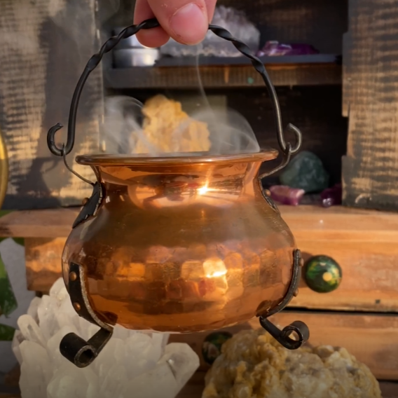 herbal incense in a cauldron