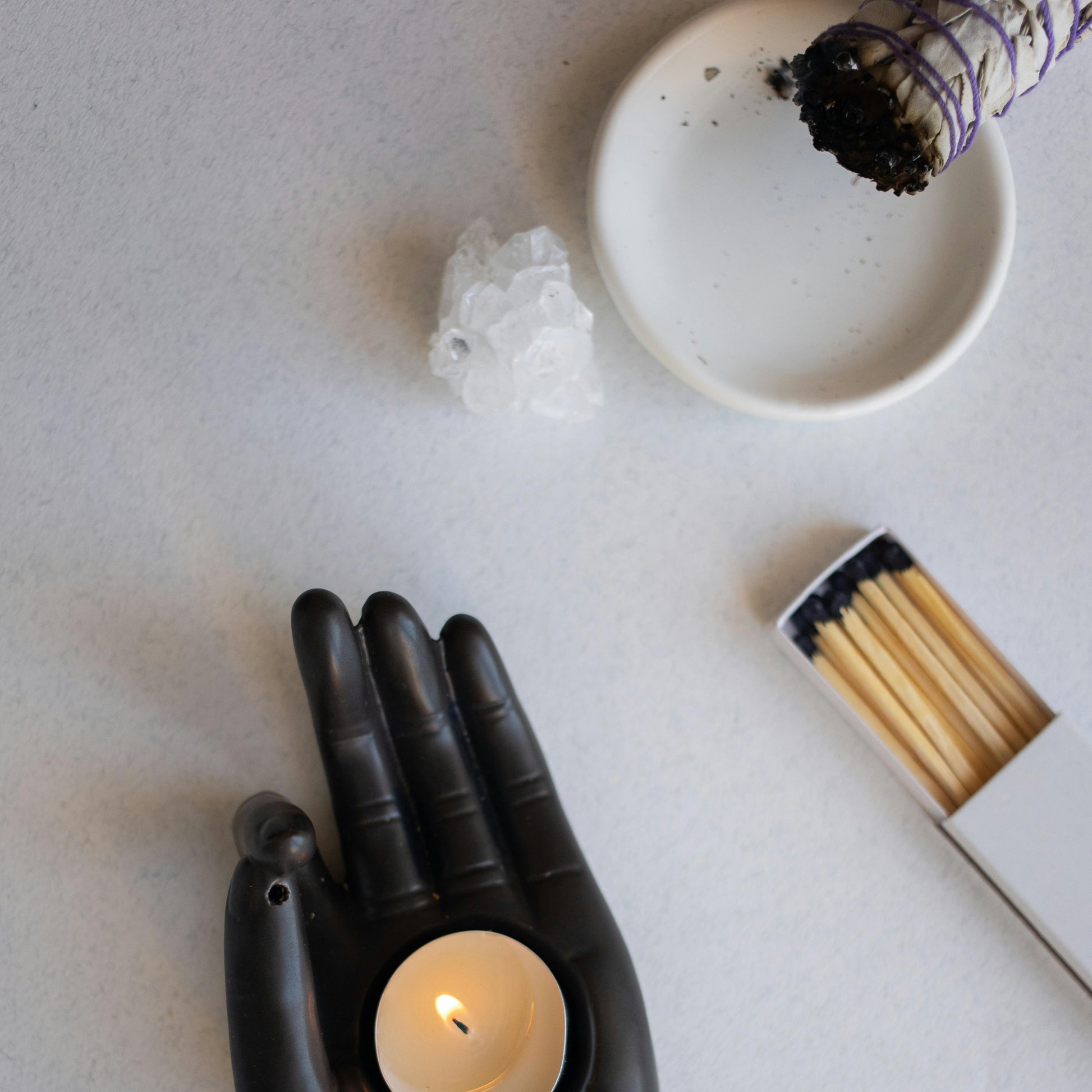 smudge stick on white bowl