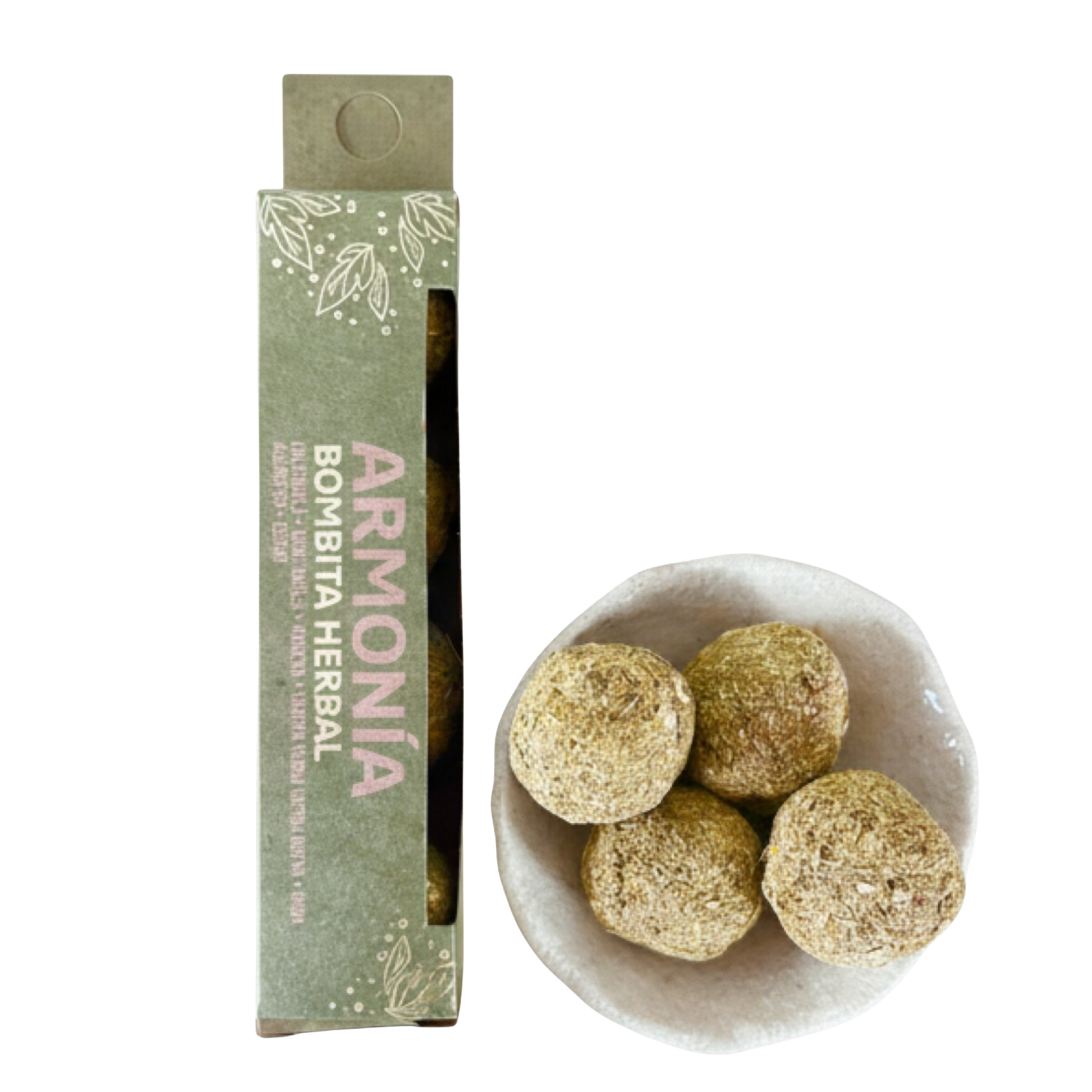 Herbal balls in a bowl with packaging labeled 'Armonía Bombita Herbal' on a white background