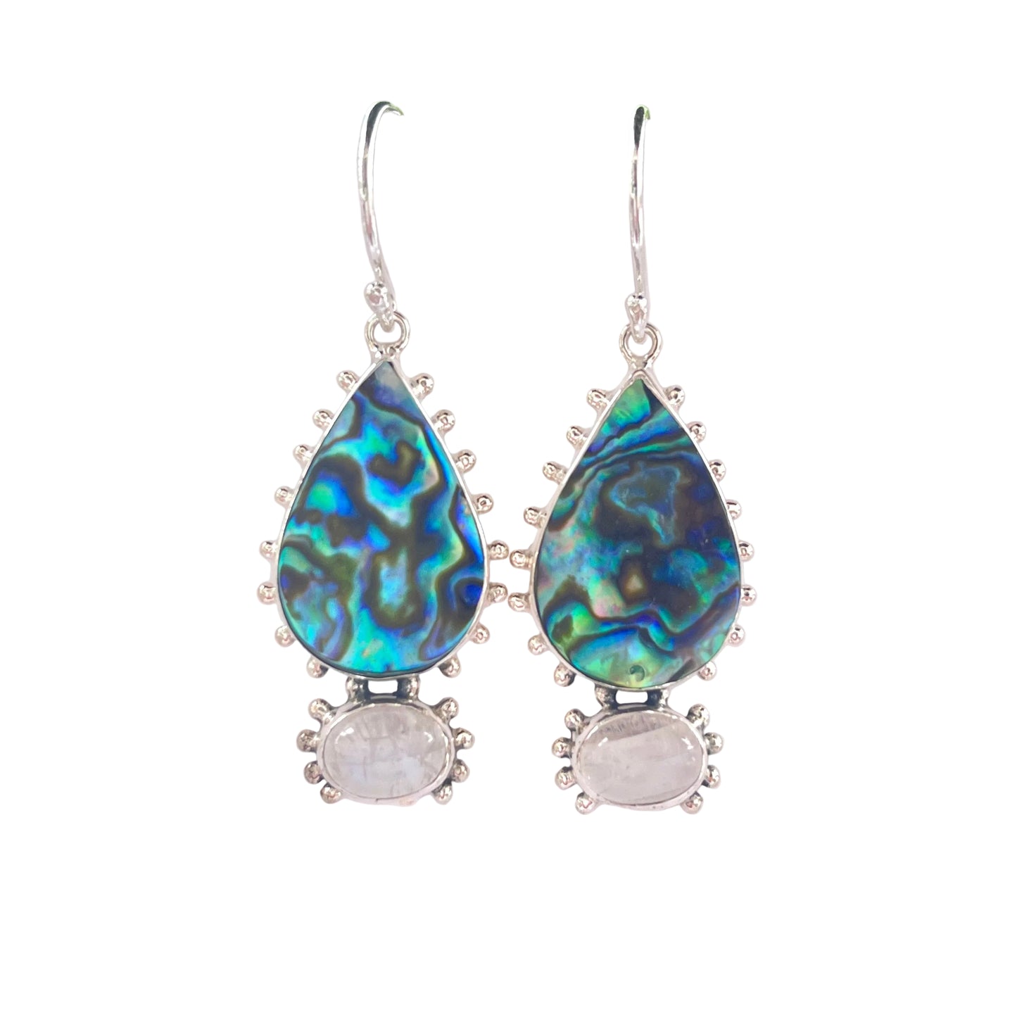 Teardrop-shaped earrings with paua shell and silver accents on a white background