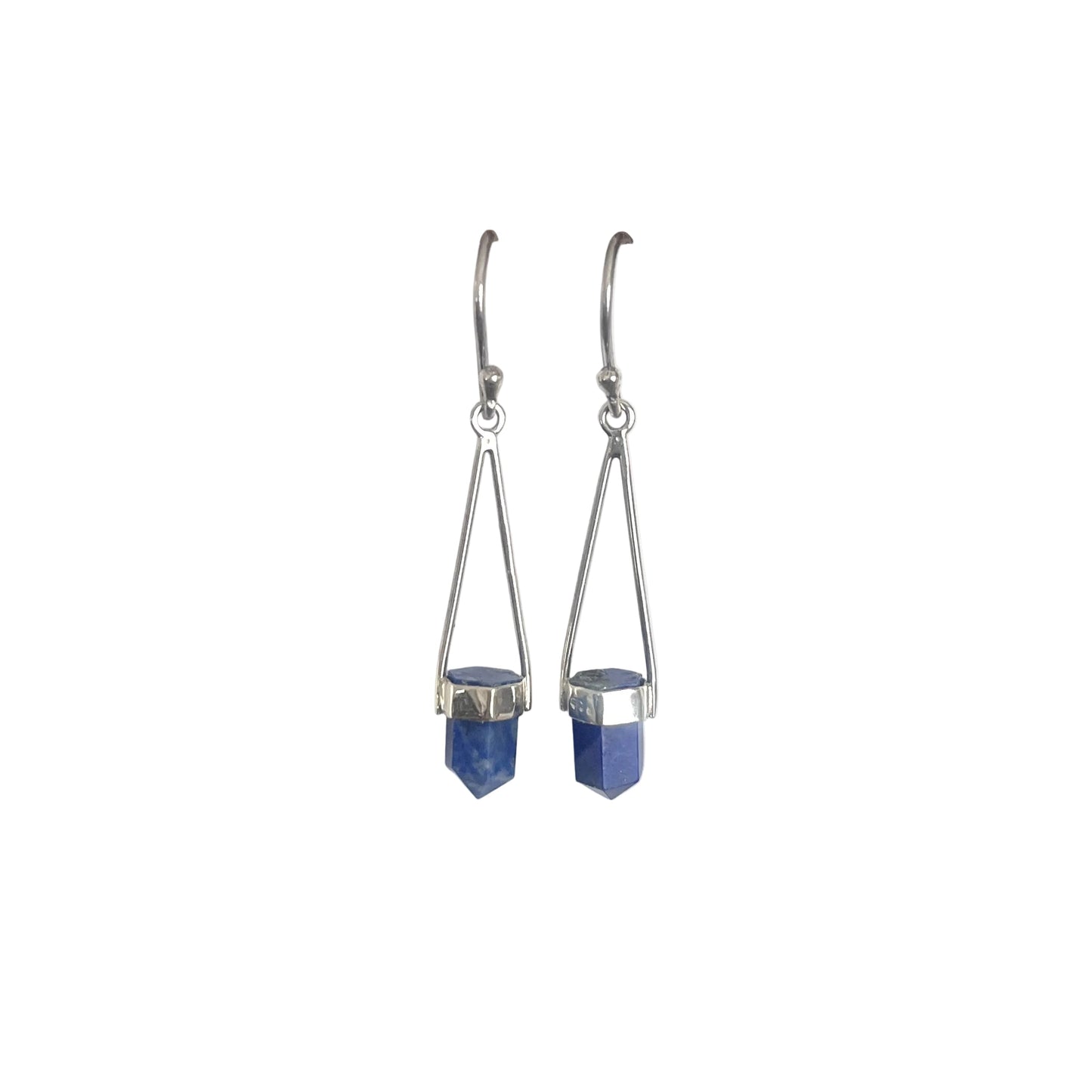 Silver earrings with blue stone drops on a white background