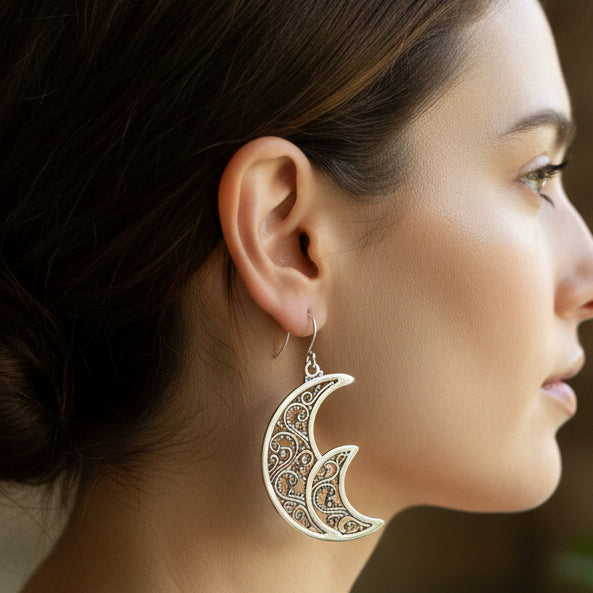 sterling silver earrings in crescent moon shape
