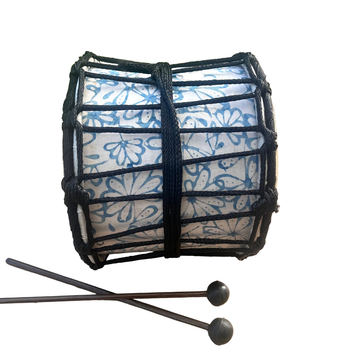 A hand drum with a white paper body printed in blue floral patterns, wrapped in a black wooden frame and tied with black cord, 