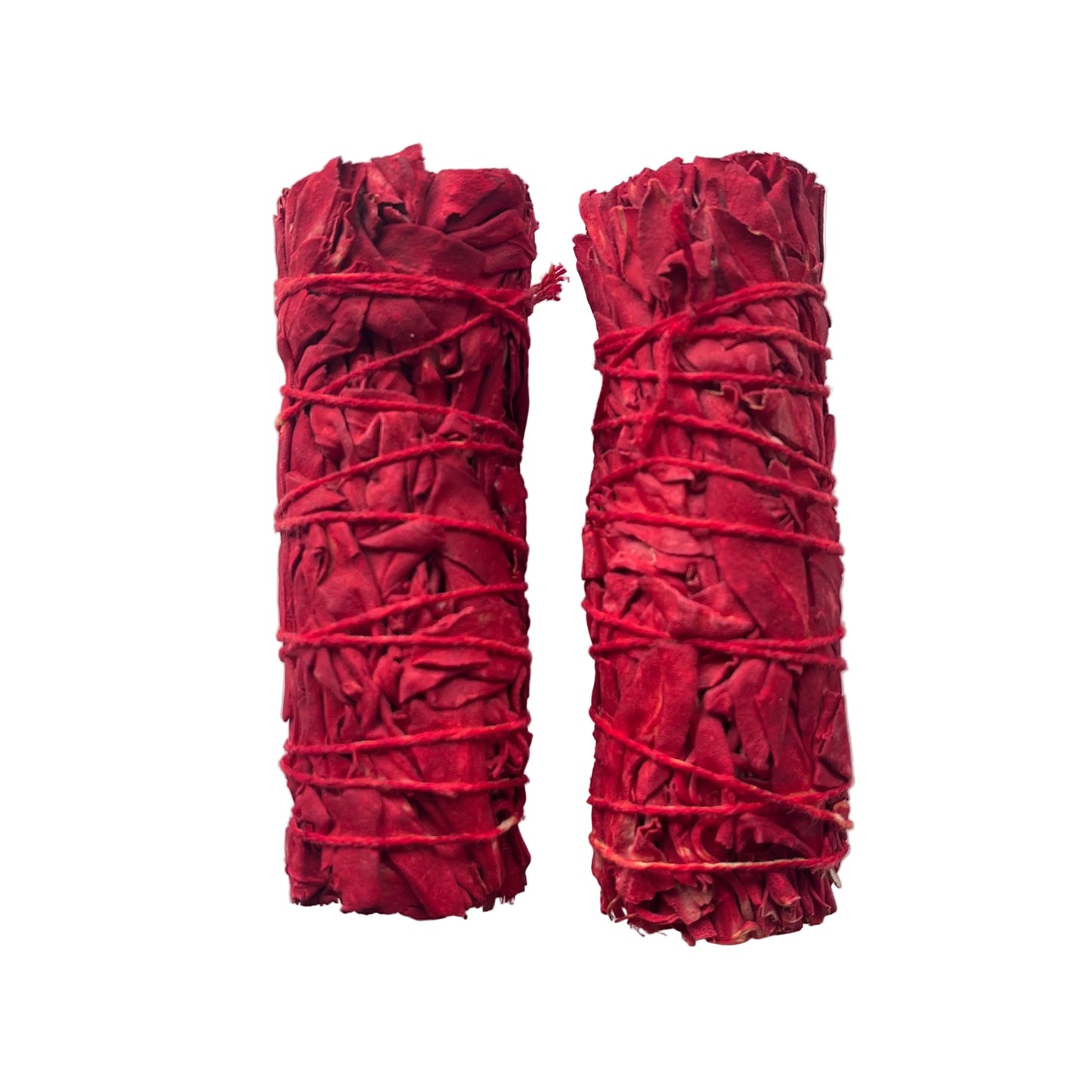 Two dried dragons blood smudge bundles wrapped in red string, arranged vertically 