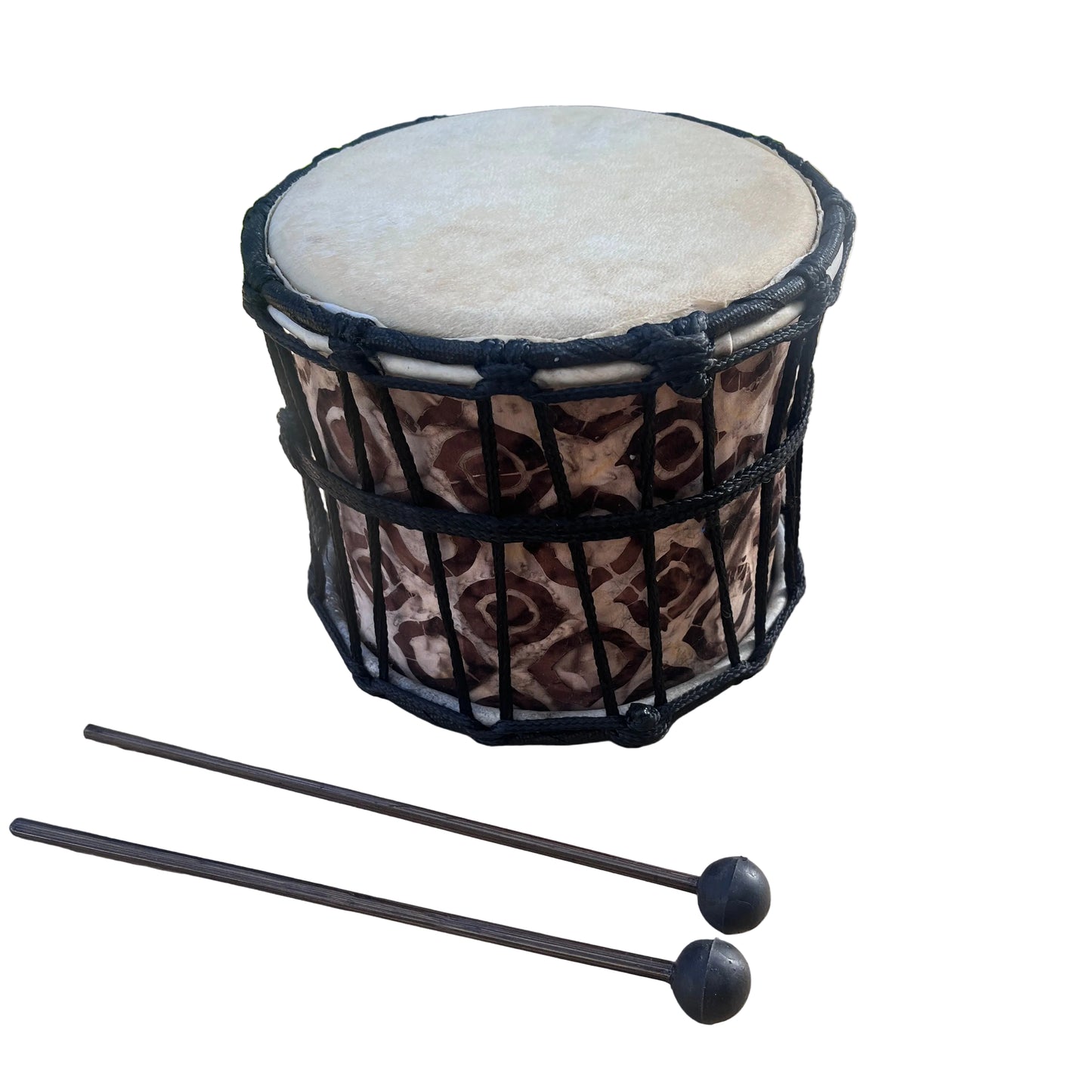 A hand drum with a brown and beige patterned body, black rope tensioning, and a light beige drum head, shown with two mallets in front.