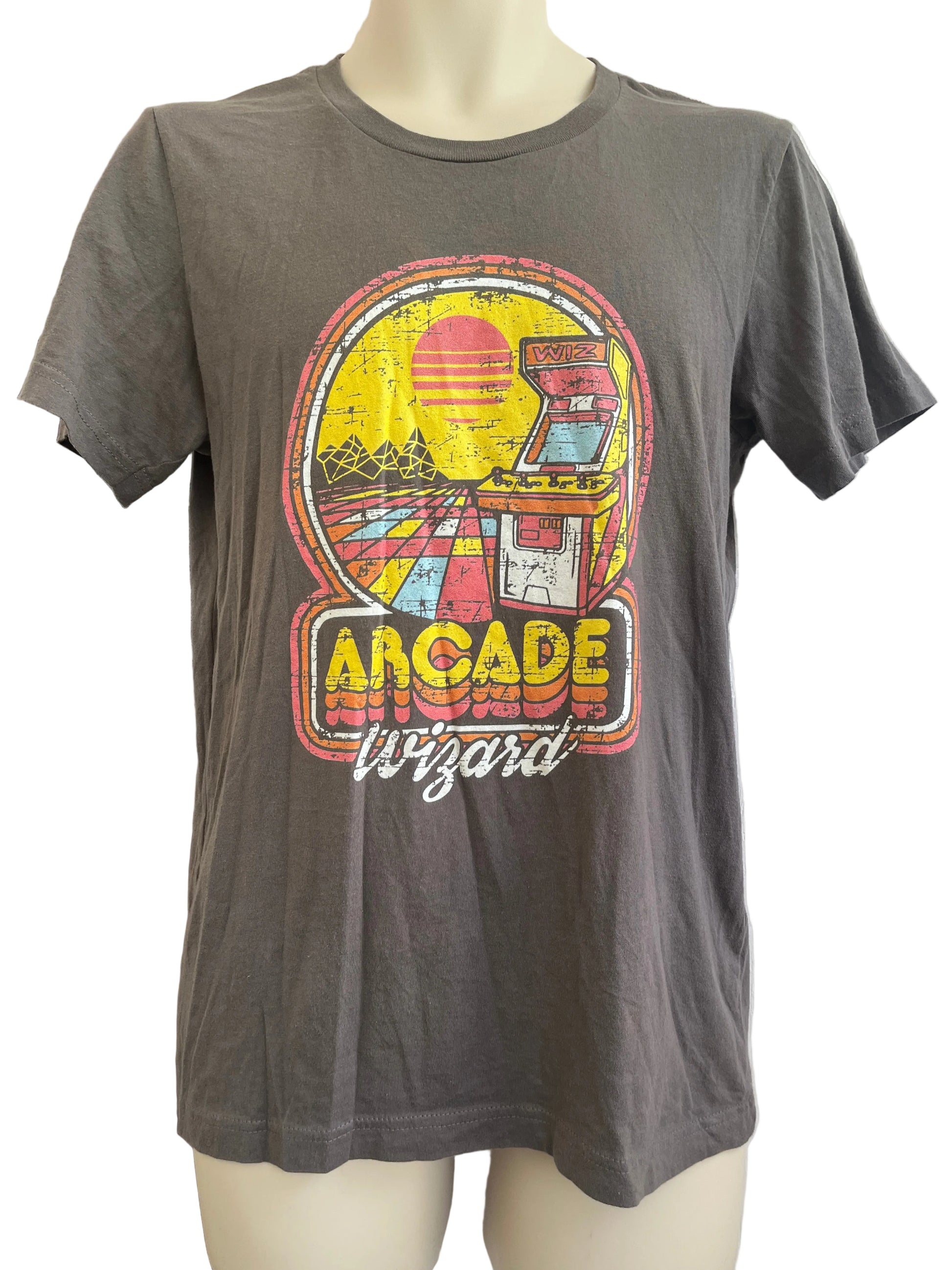 Gray tshirt with 'Arcade Wizard' graphic on a mannequin against a neutral background