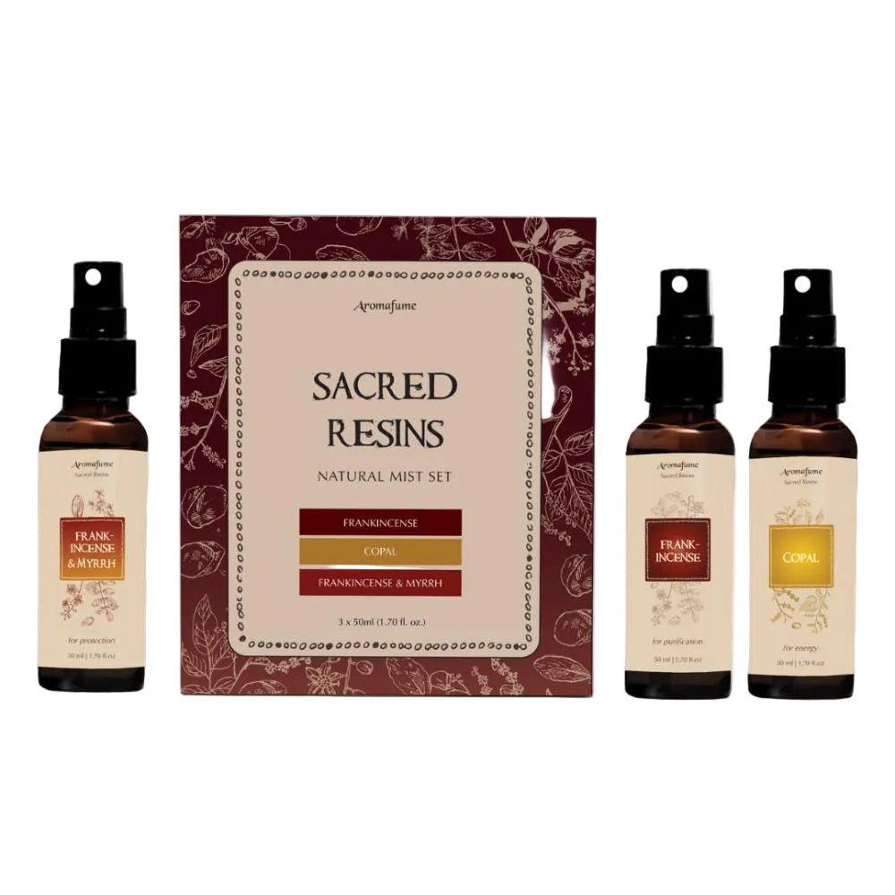 Aromafume Sacred Resins natural mist set with three bottles and a box on a white background