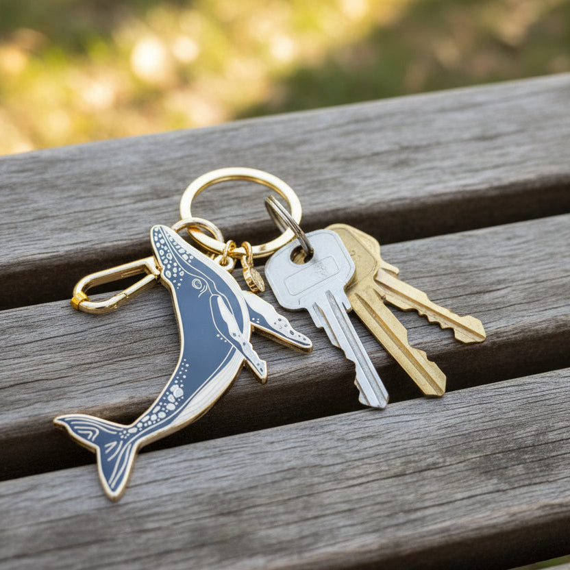 Gold and silver whale keychain 