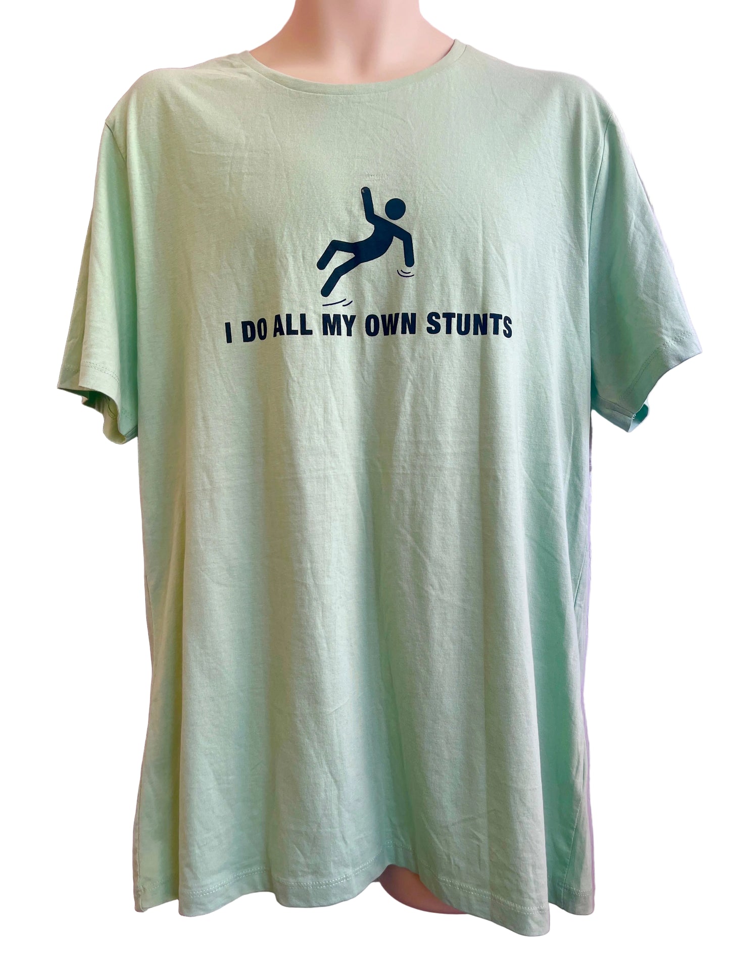 Light green t-shirt with graphic and text on a mannequin