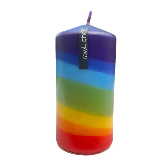 Multicolored striped candle with 'rawLight' branding 