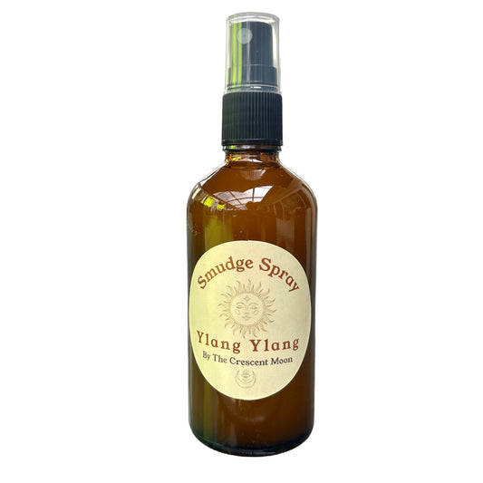 Bottle of Smudge Spray labeled 'Ylang Ylang' by The Crescent Moon 