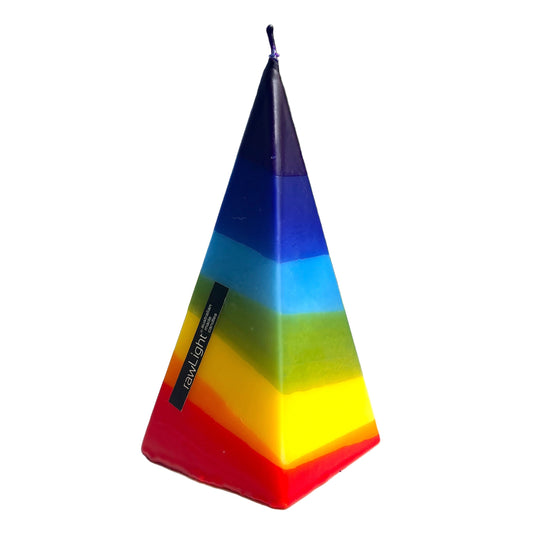 Colorful pyramid-shaped rainbow candle with a brand logo on a white background