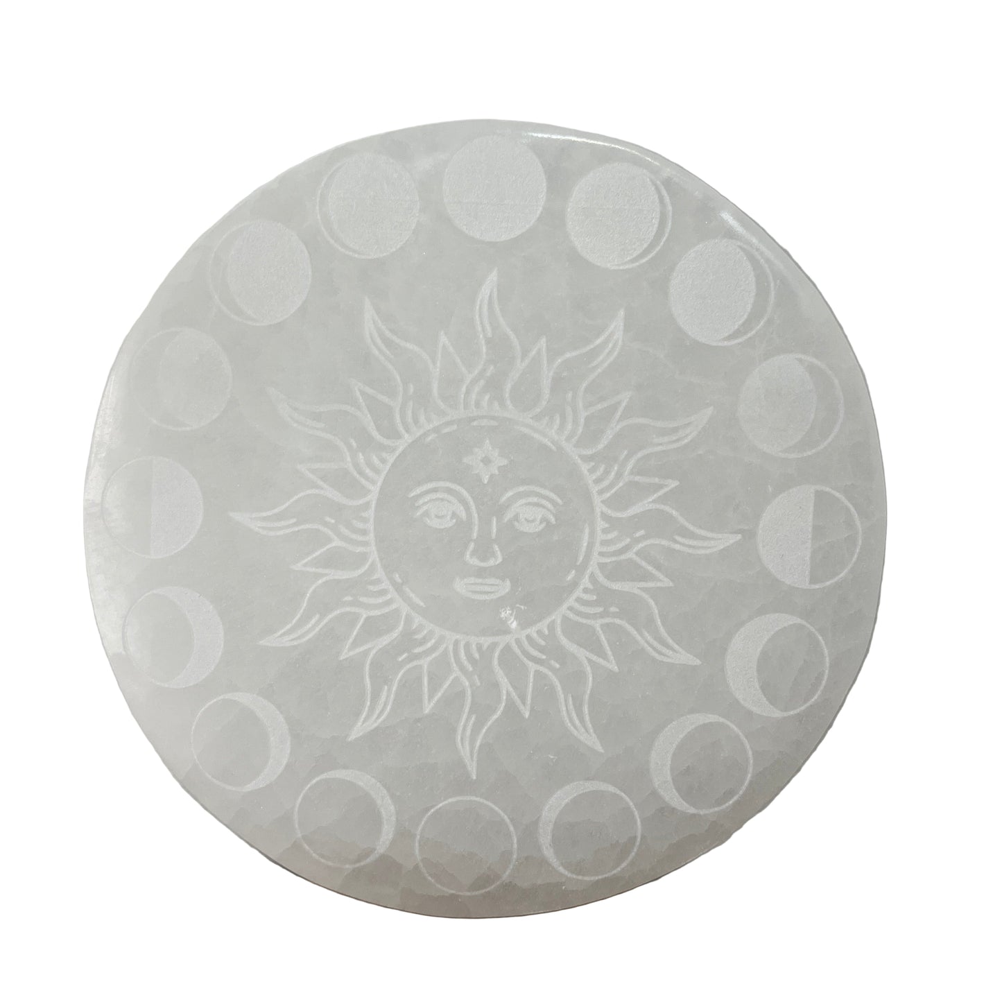 sELENITE PLATE with sun and moon phases engraving on a plain background