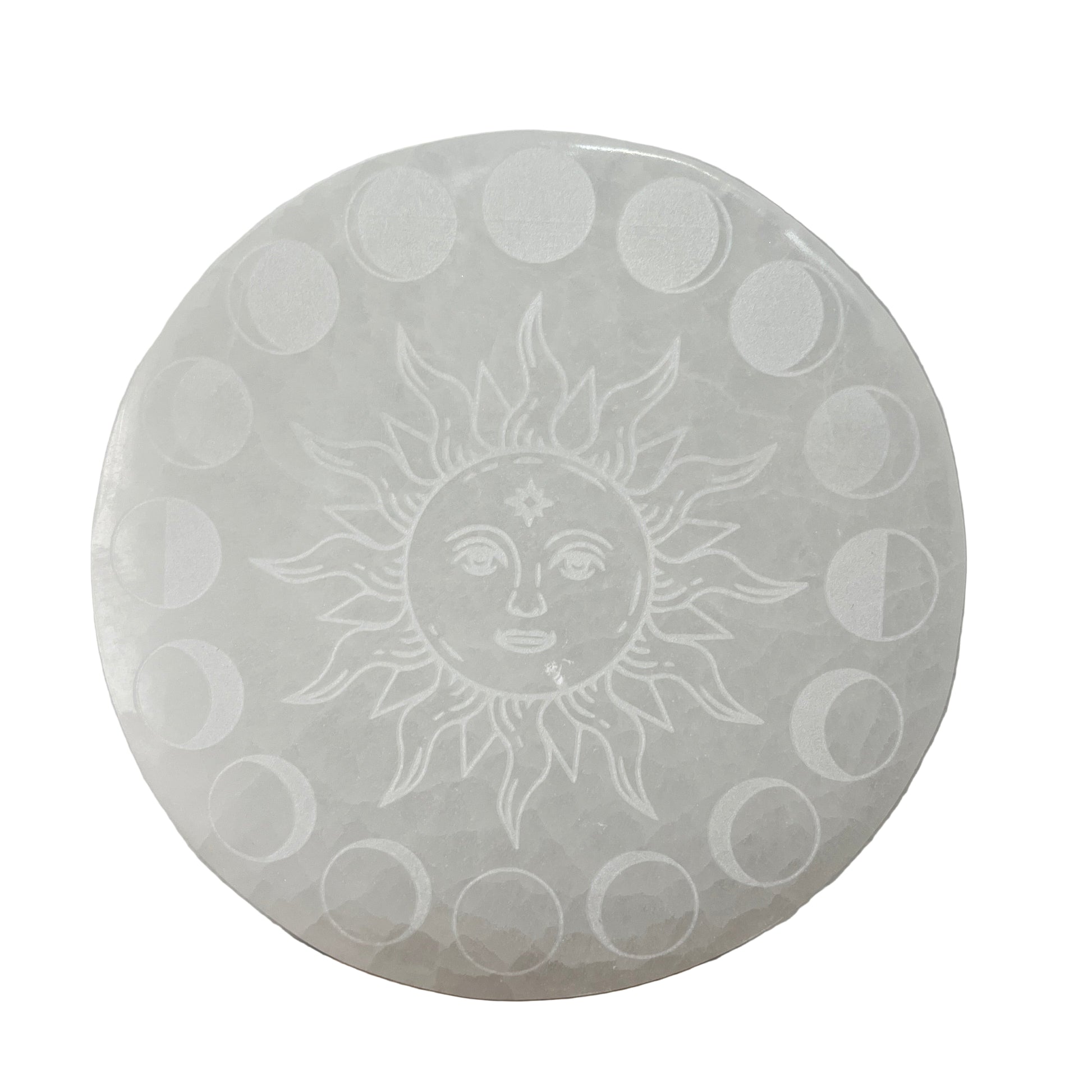 sELENITE PLATE with sun and moon phases engraving on a plain background