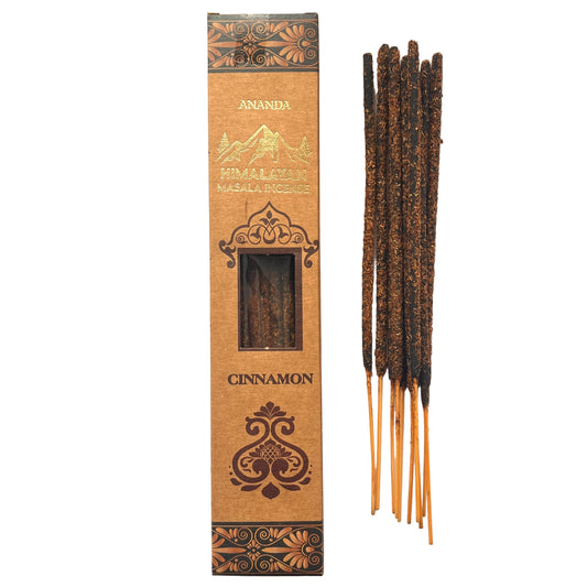 Cinnamon incense sticks with decorative packaging on a white background