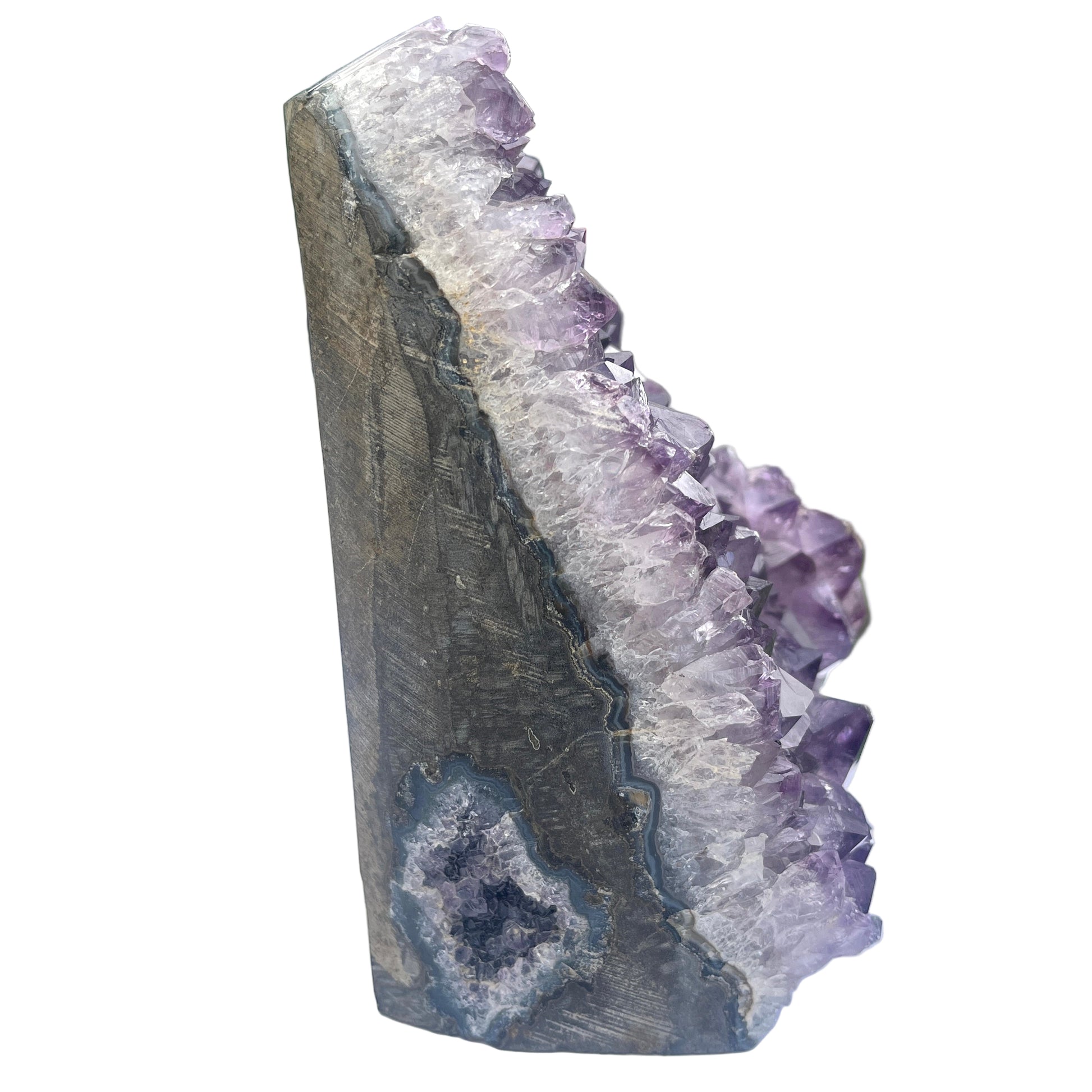 Amethyst crystal on a white surface 