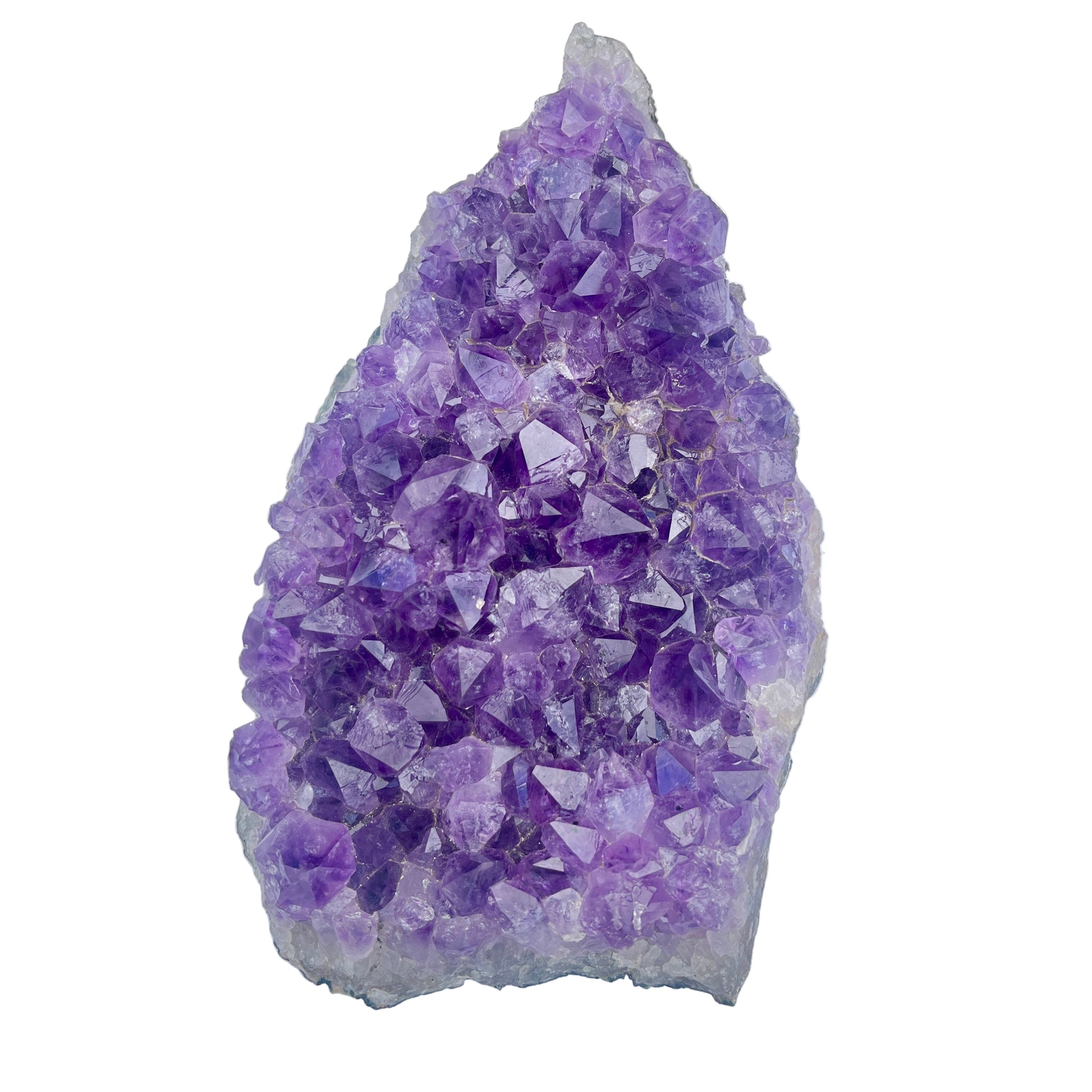 Amethyst crystal cluster on a white background