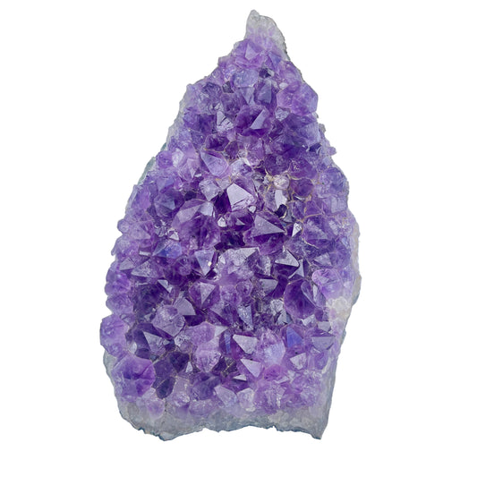 Amethyst crystal cluster on a white background