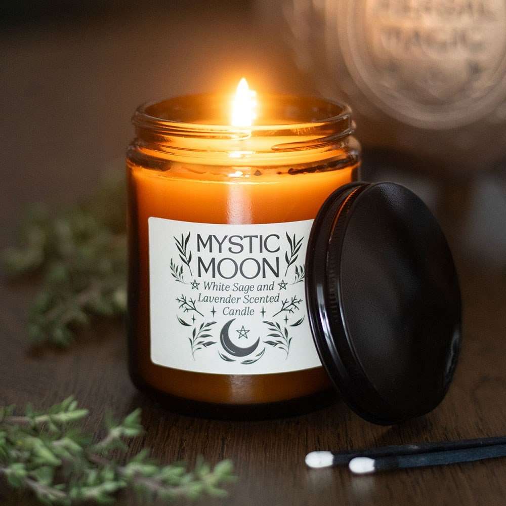 Mystic Moon candle with a label on a wooden surface