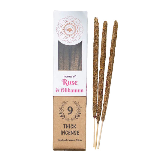 Incense sticks with packaging labeled 'Rose & Olibanum' 