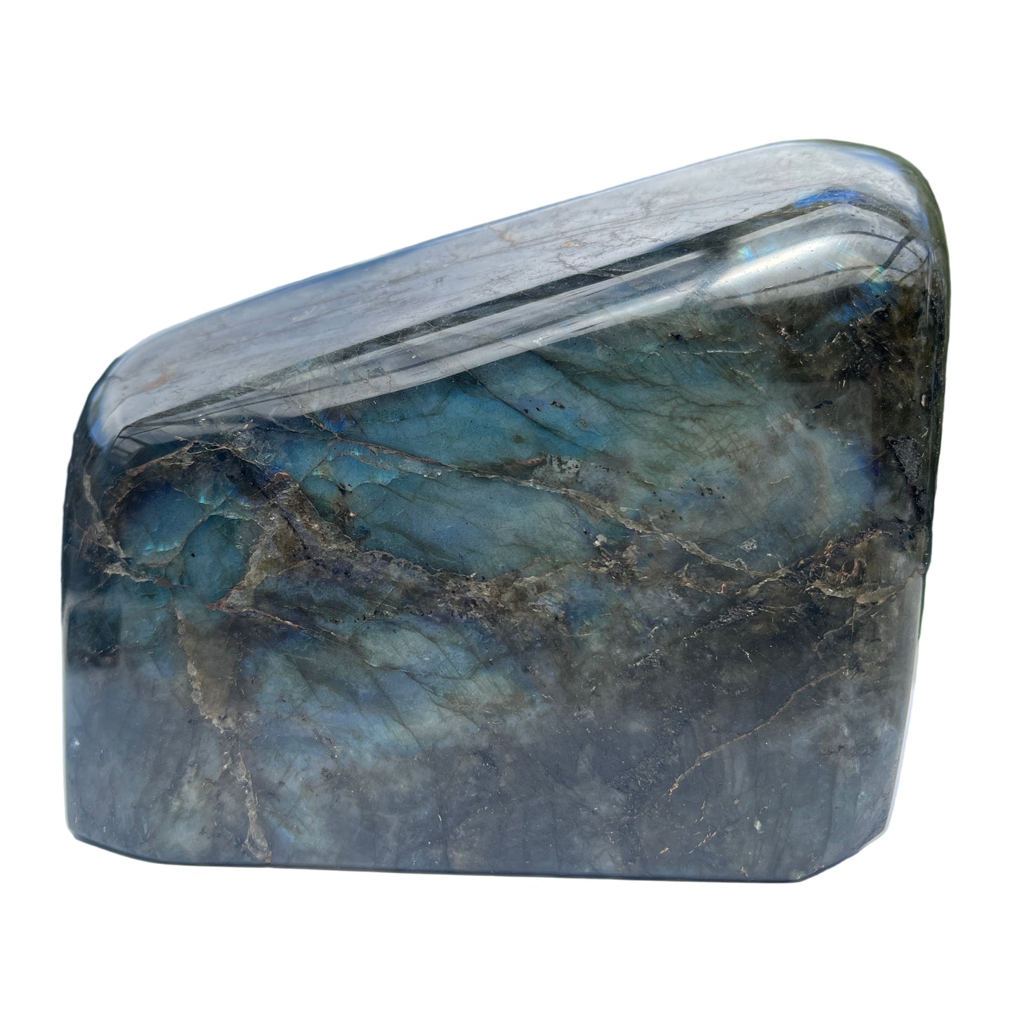 Polished labradorite stone on a white surface 