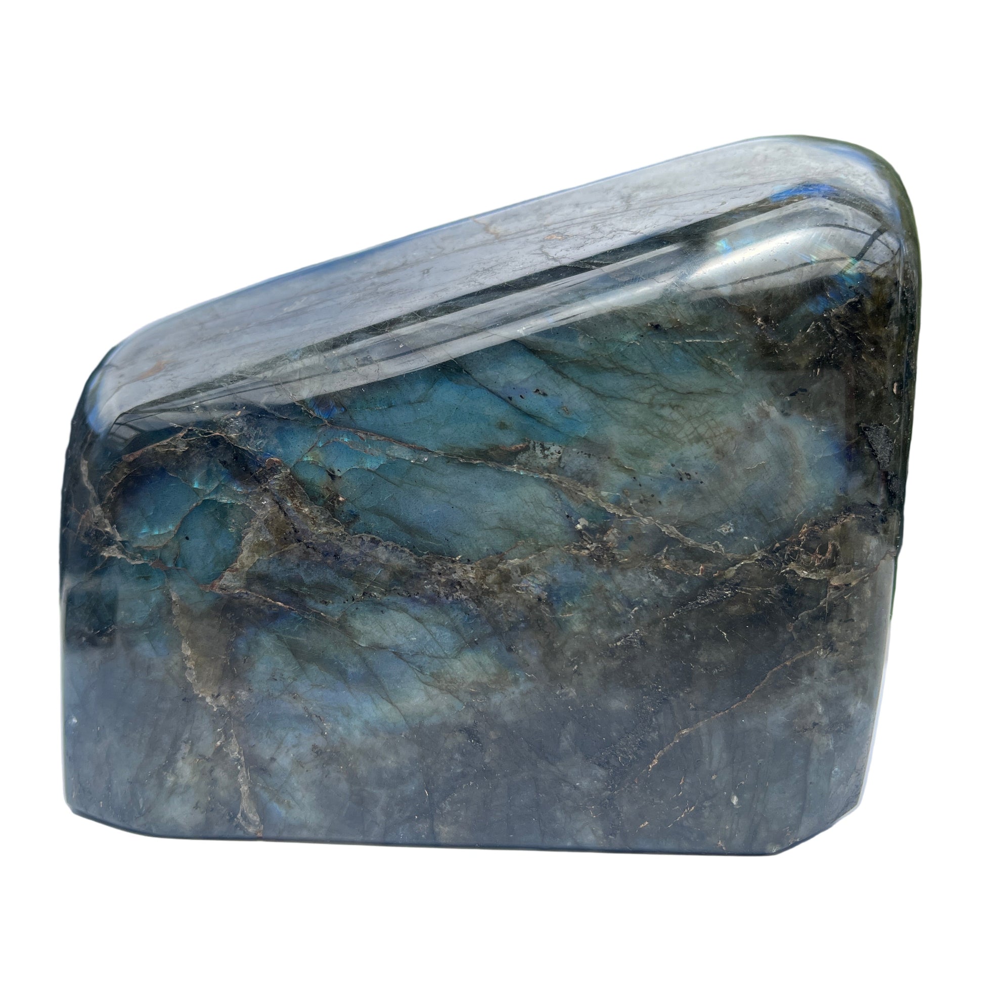 Polished labradorite stone on a white surface 