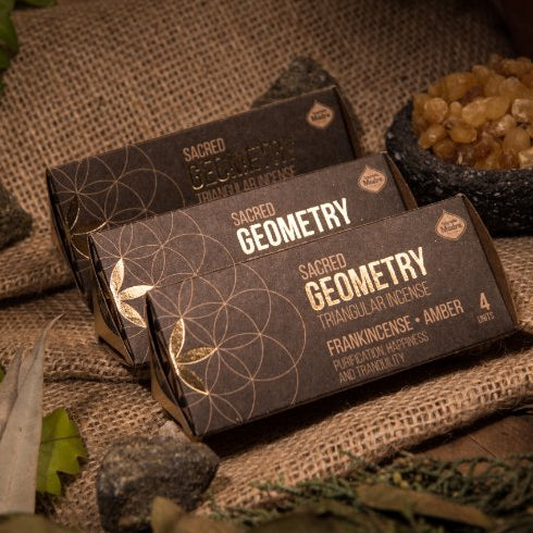 Sacred Geometry incense packaging on a rustic background with natural elements.