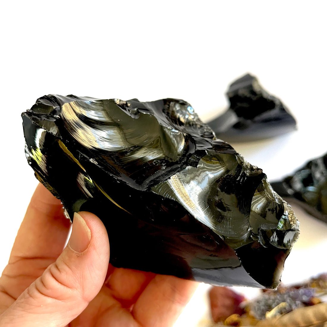 Large chunks of rough black obsidian