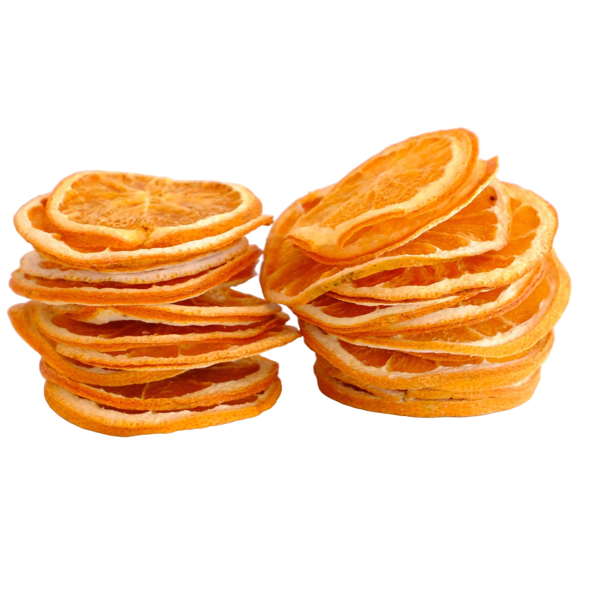 Two stacks of dried orange slices on a clean white background.