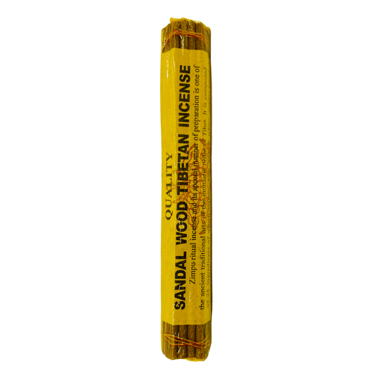 A bundle of Tibetan incense sticks wrapped in a bright yellow paper sleeve with black text reading 'SANDAL WOOD TIBETAN INCENSE' and 'QUALITY' at the top, photographed on a plain white background.